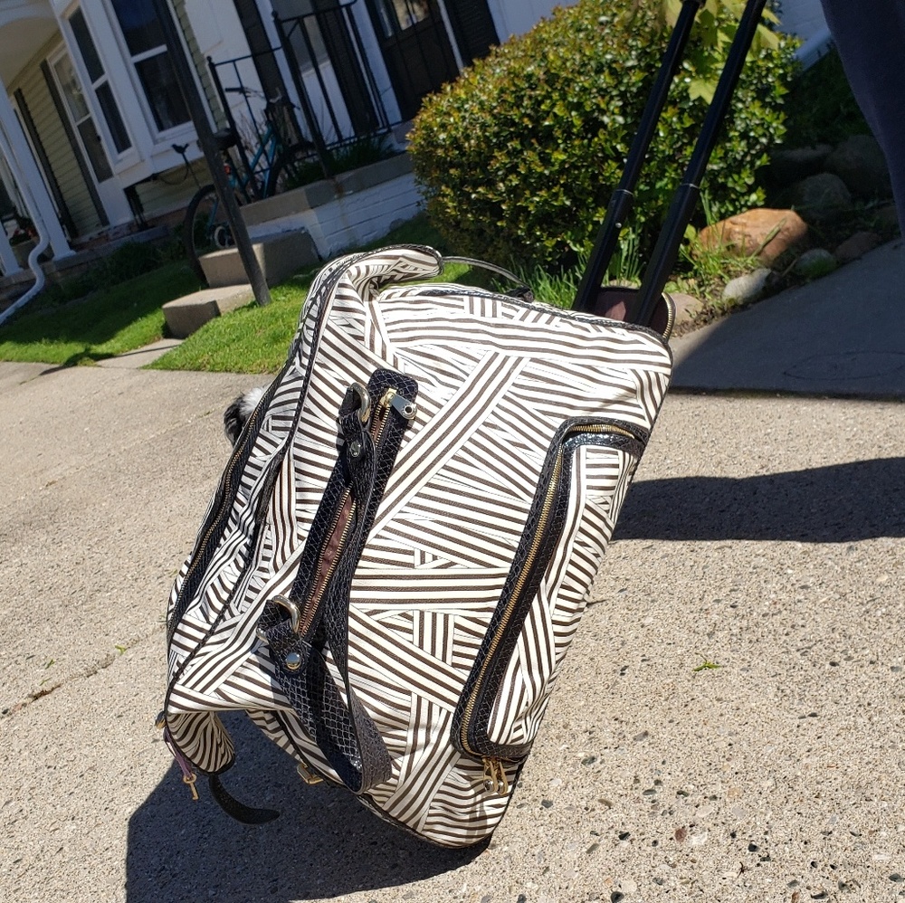 Henri bendel wheelie luggage